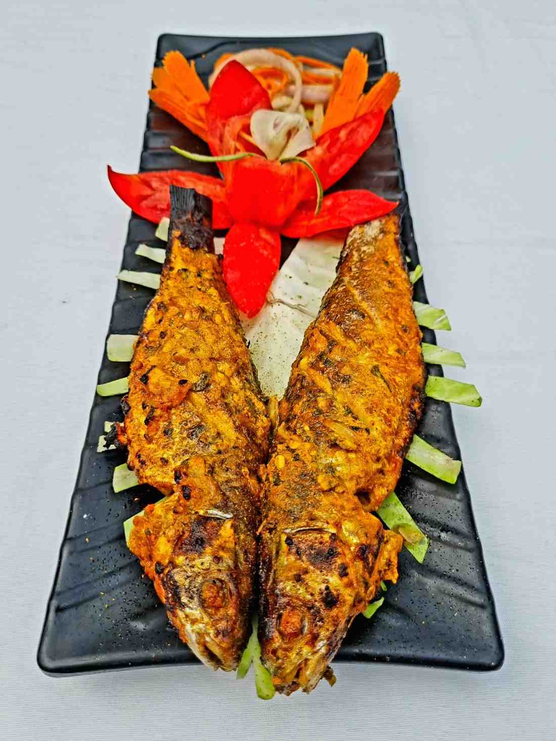 Whole grilled fish from the resort kitchen