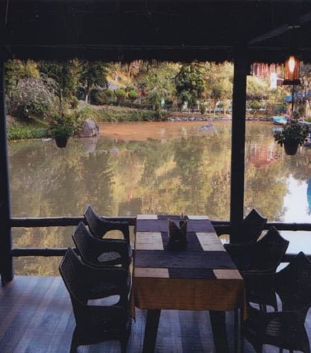 Covered seating looking out over the pond